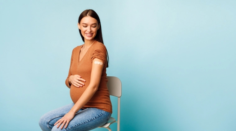 Zwangere vrouw die vaccin heeft gehad